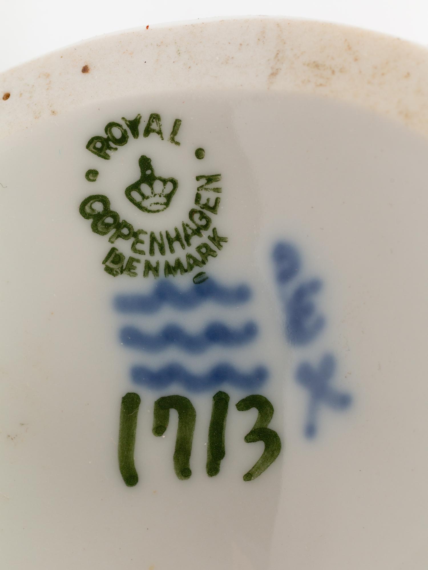 A Group of Nine Royal Copenhagen Porcelain Figures