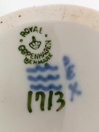 A Group of Nine Royal Copenhagen Porcelain Figures