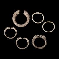 Six Chinese Silver 'Dragon' Bracelets, Qing Dynasty 清 銀龍頭紋鐲六隻