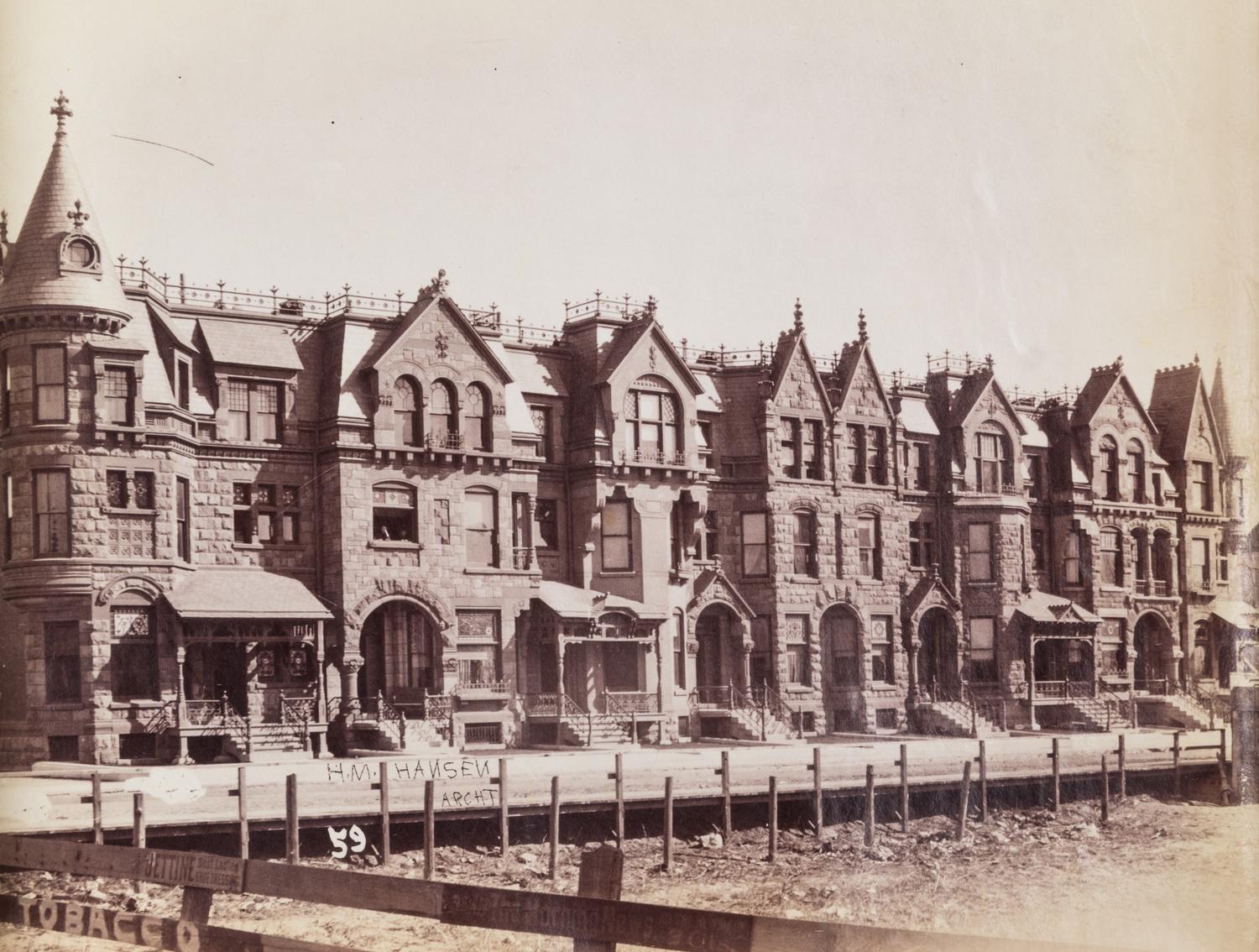 (CHICAGO) PHOTO ALBUM. Three photo albums with 229 linen-backed photos of Chicago and the Midwest.