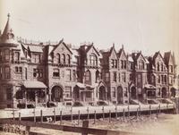 (CHICAGO) PHOTO ALBUM. Three photo albums with 229 linen-backed photos of Chicago and the Midwest.