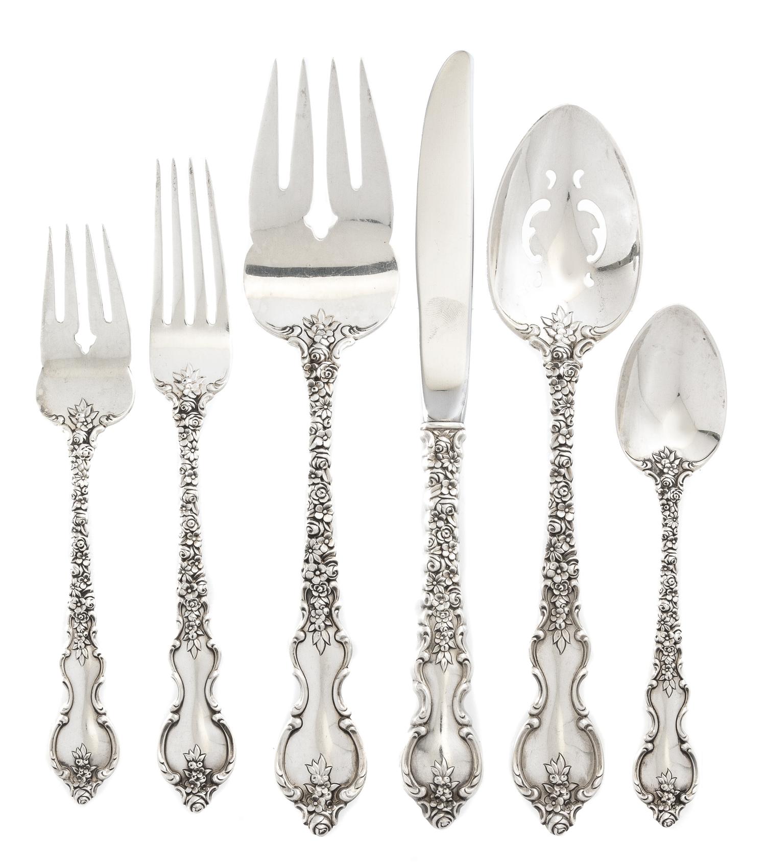 An American Silver Flatware Service, International Silver Co., Meriden, CT, Du Barry pattern, comprising: 8 dinner knives 8 dinner fork