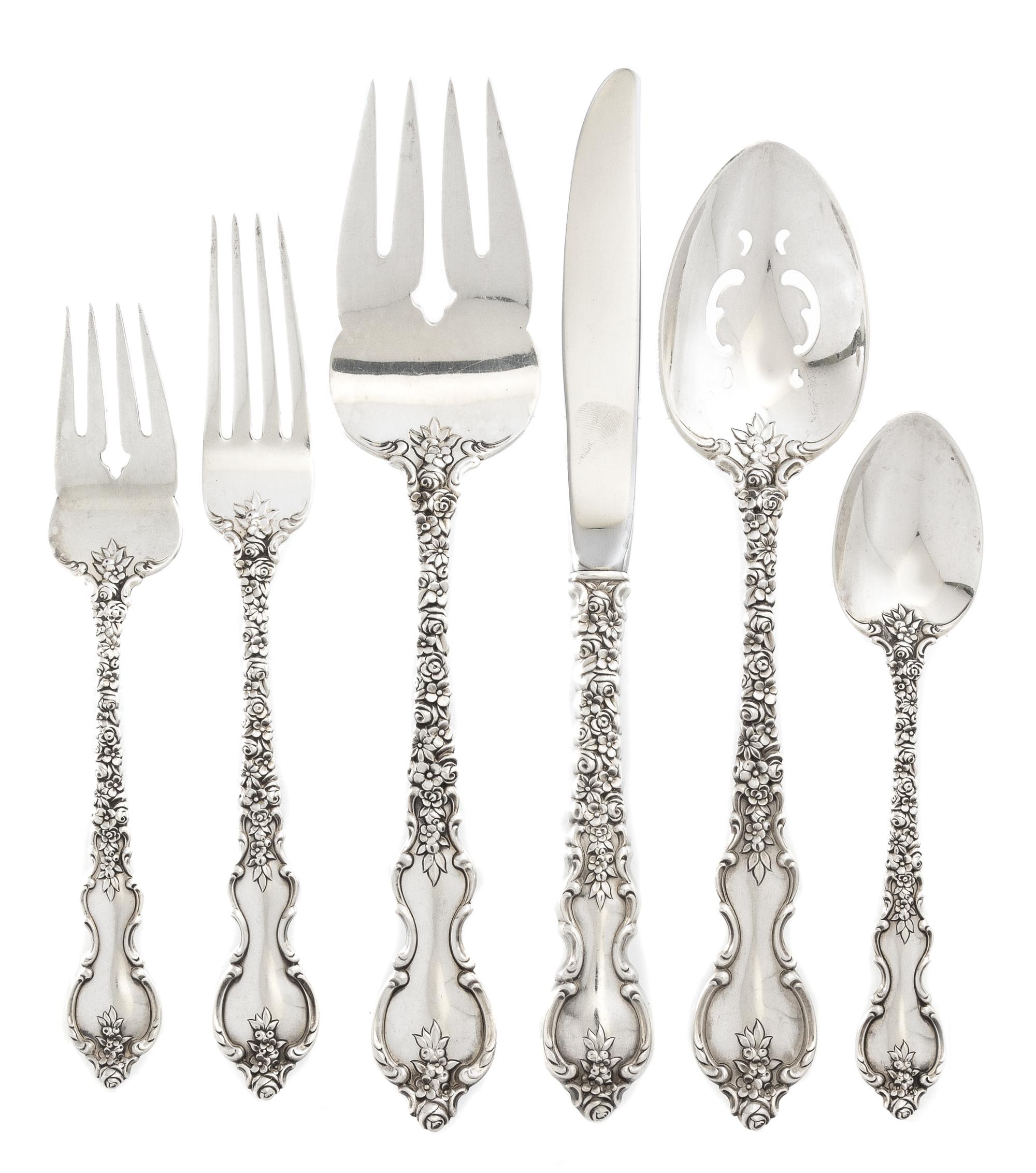 An American Silver Flatware Service, International Silver Co., Meriden, CT, Du Barry pattern, comprising: 8 dinner knives 8 dinner fork