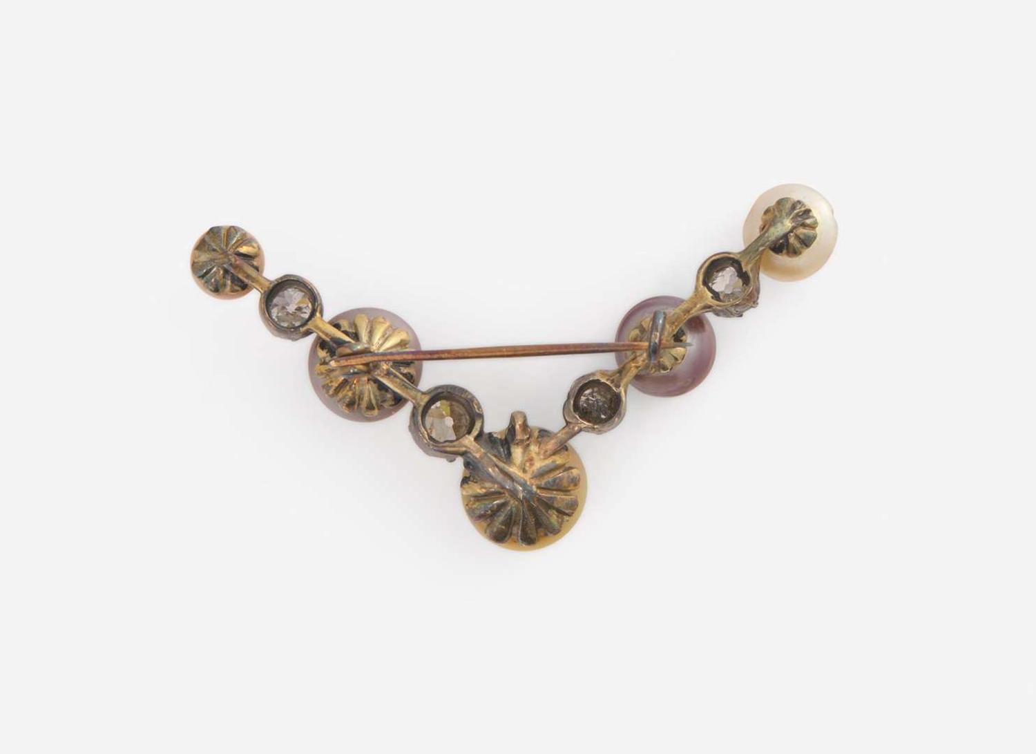 A Silver-Topped 14K Gold, Pearl, and Diamond Brooch