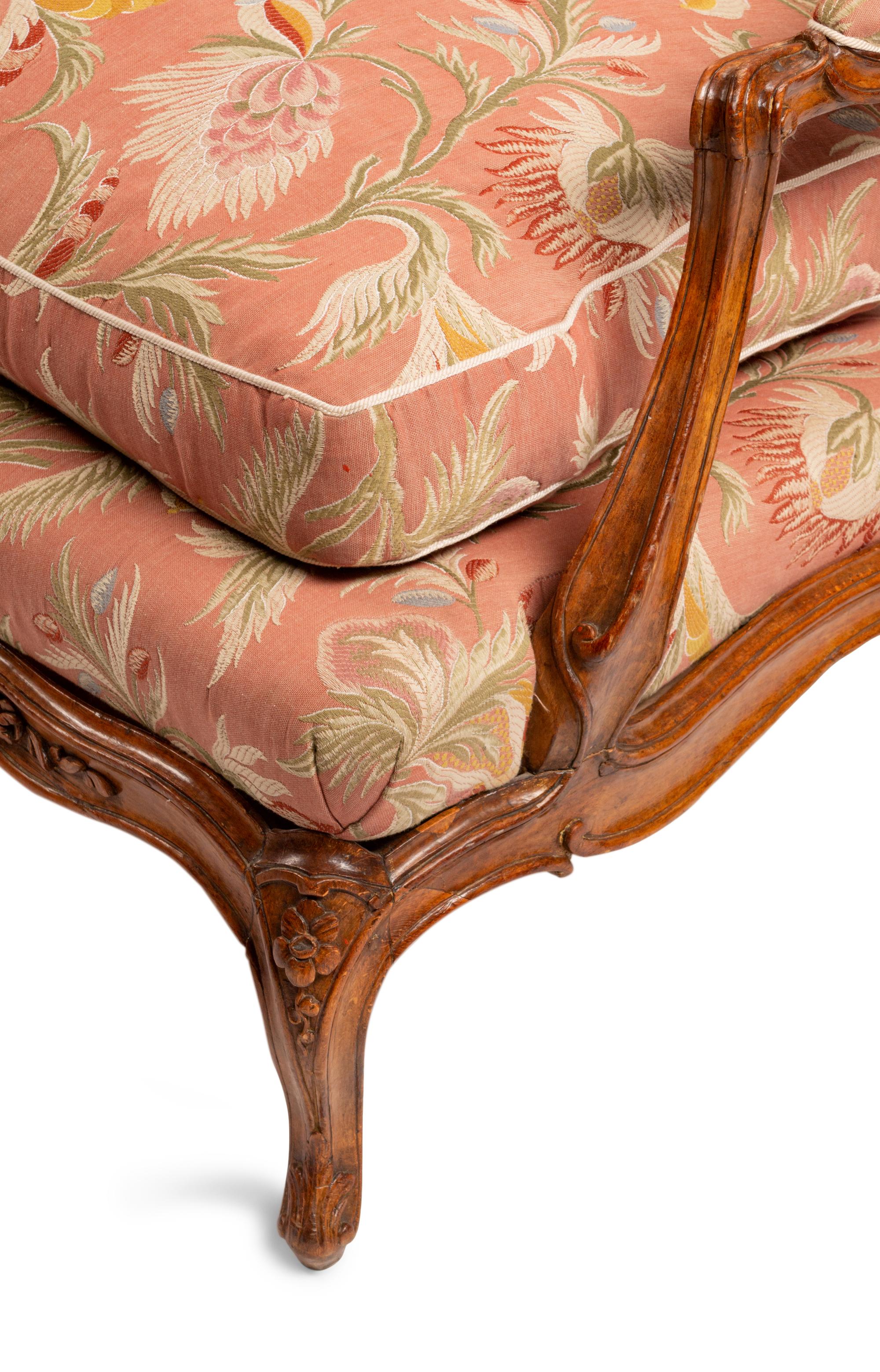 A Louis XV Provincial Carved Walnut Canapé — 19TH CENTURY