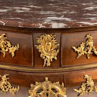 A Louis XV Kingwood Parquetry and Gilt Bronze Mounted Marble-Top Commode