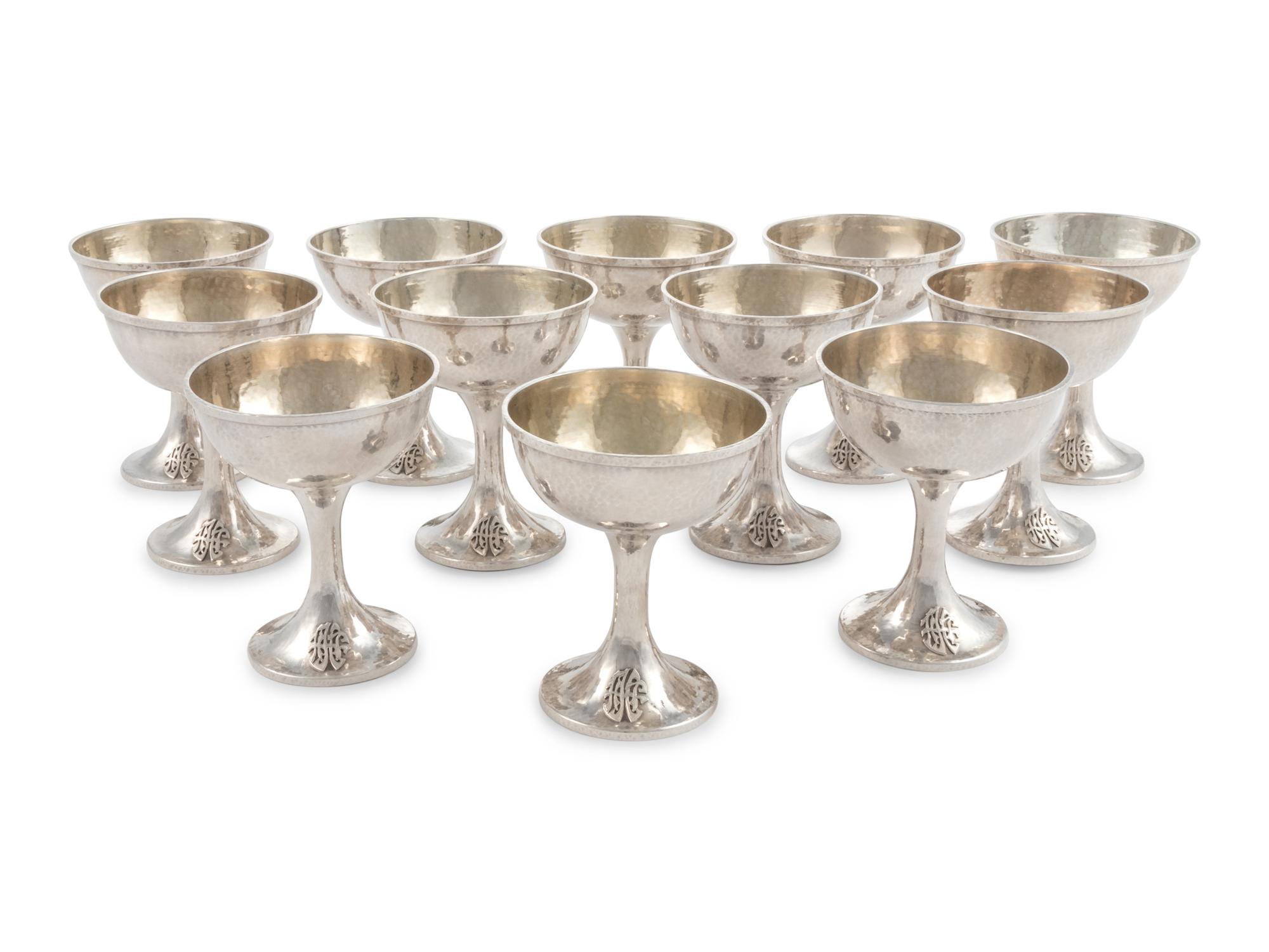 A Set of Twelve American Arts & Crafts Silver Coupes