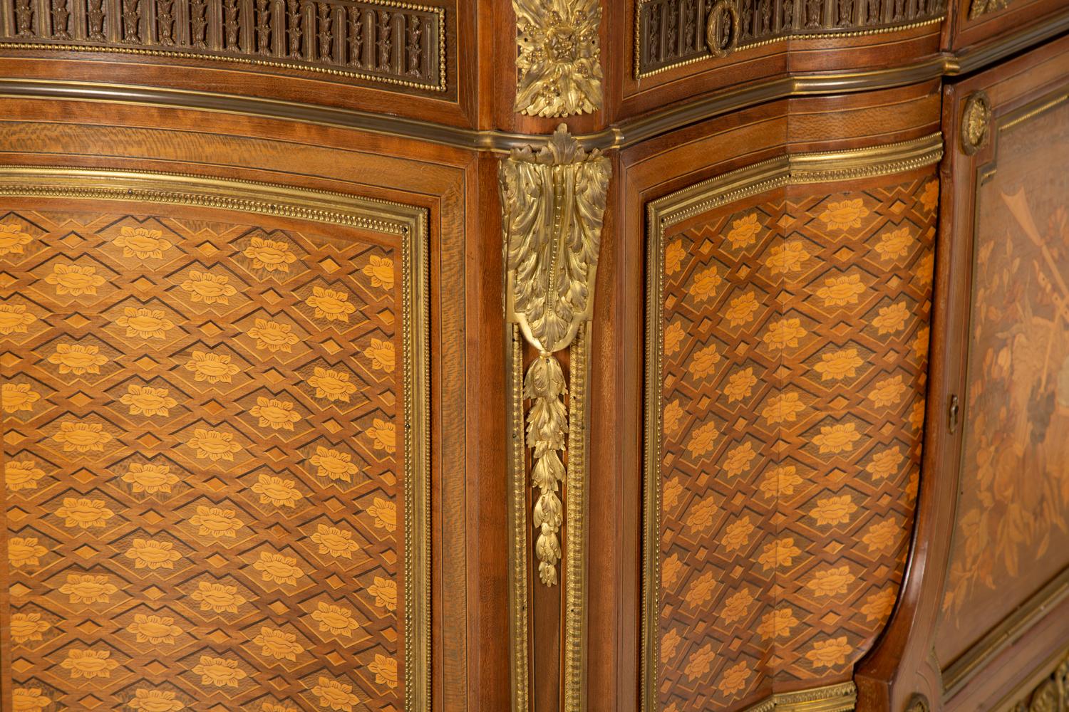 A Louis XVI Style Gilt Bronze Mounted Kingwood and Marquetry Marble-Top Commode