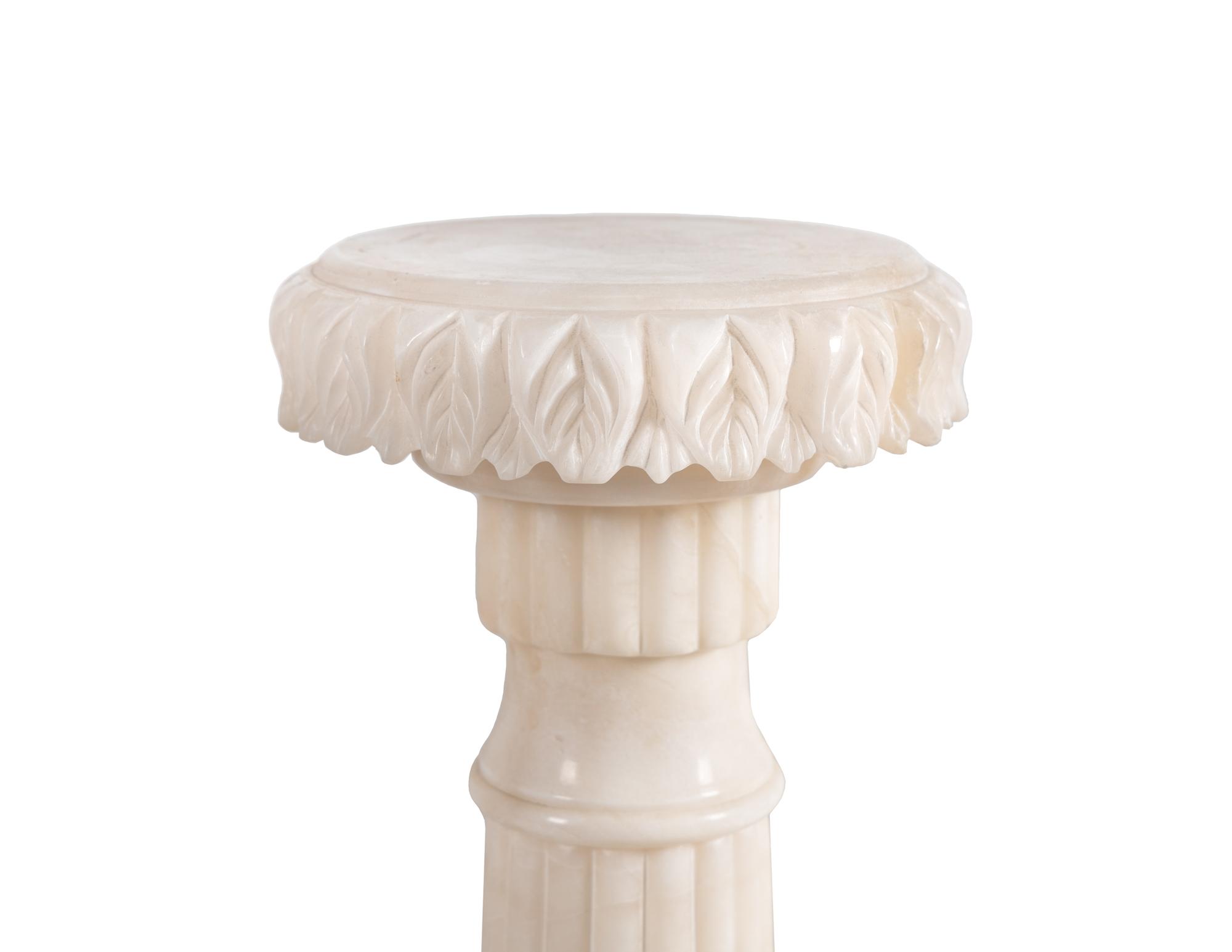 A Carved Alabaster Pedestal