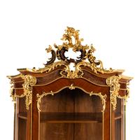 A Louis XV Style Parcel Gilt Mahogany Cabinet à Deux Corps