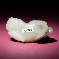 A Chinese Pale Celadon Jade Group of Fu Lions, Qing Dynasty — 清 青白玉太獅少獅把件