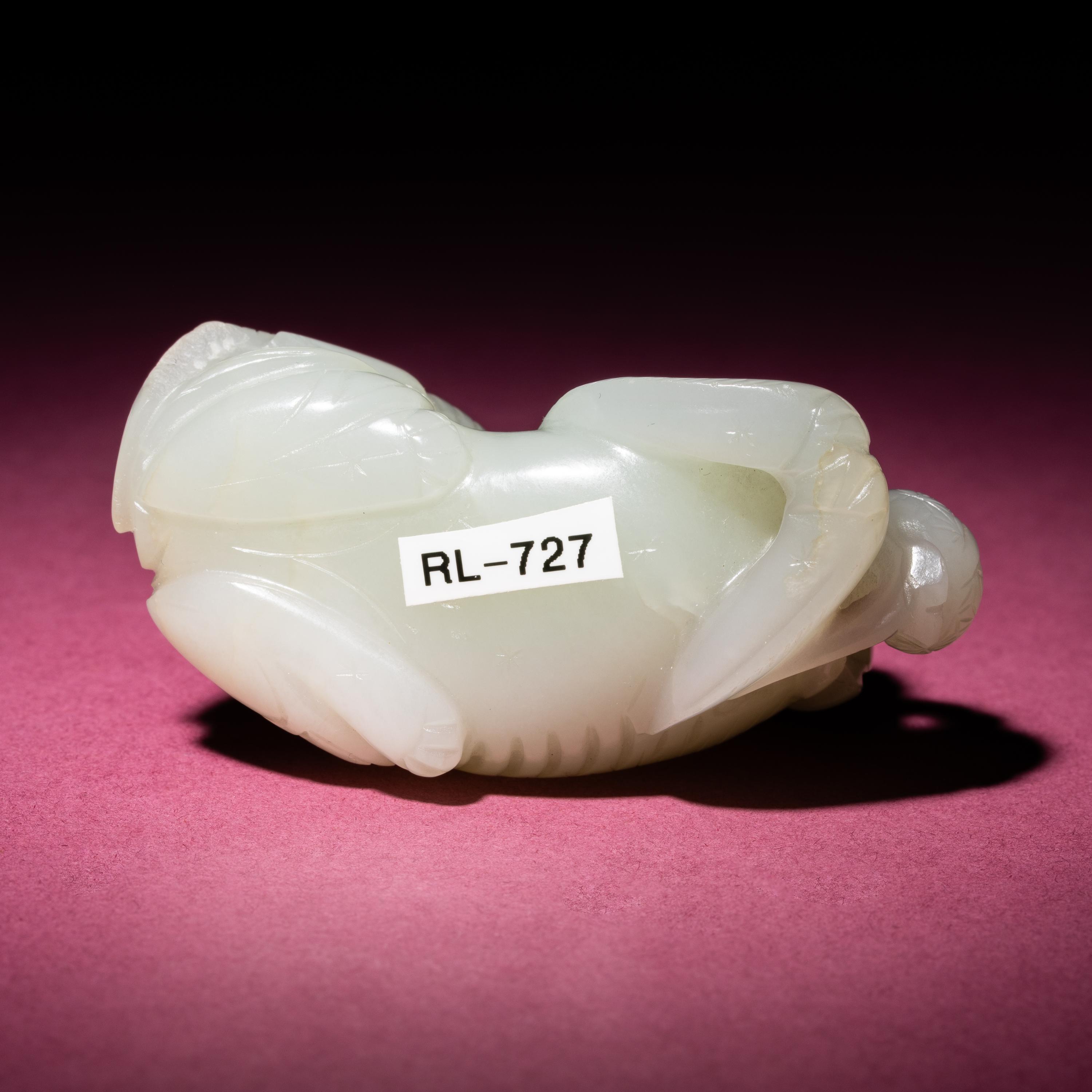 A Chinese Pale Celadon Jade Group of Fu Lions, Qing Dynasty — 清 青白玉太獅少獅把件