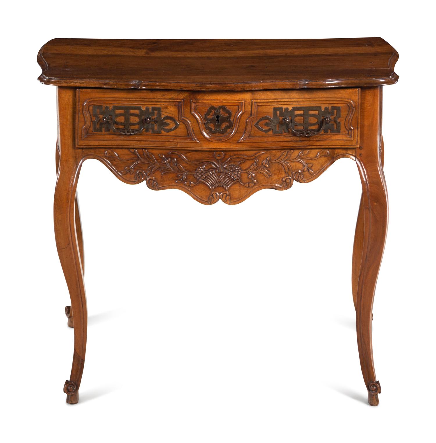 A Louis XV Provincial Carved Walnut Table