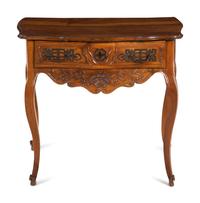A Louis XV Provincial Carved Walnut Table