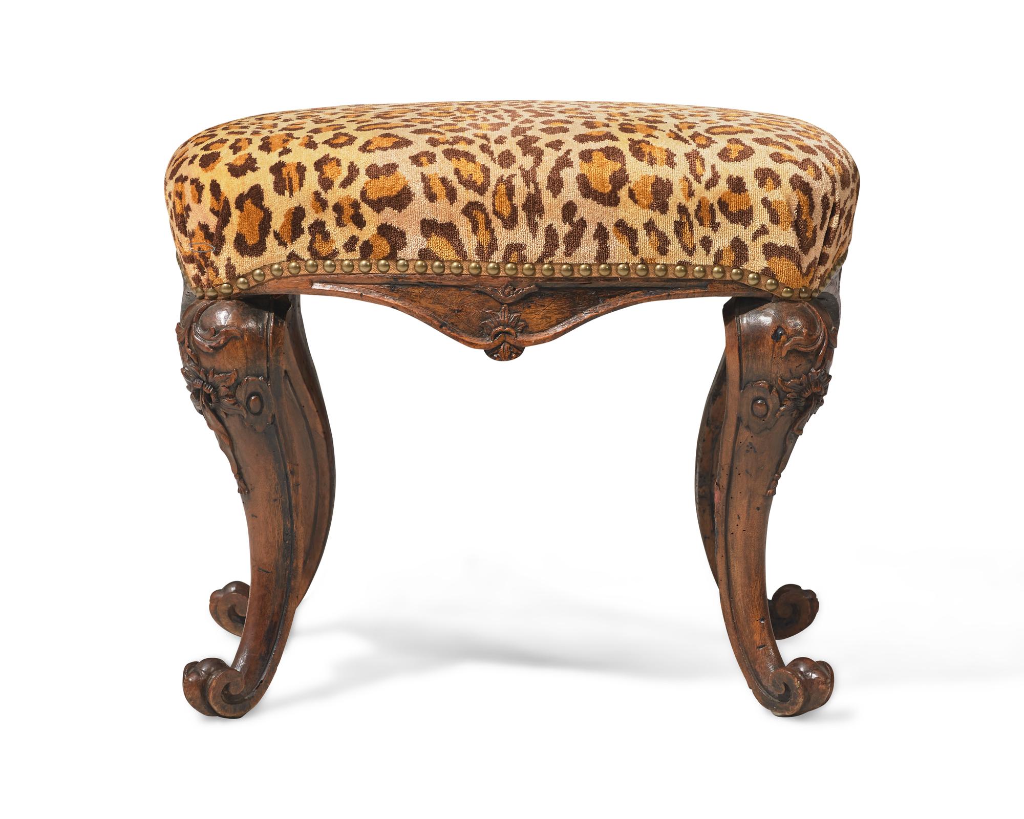 A small Portuguese Rococo carved walnut stool, 18th century