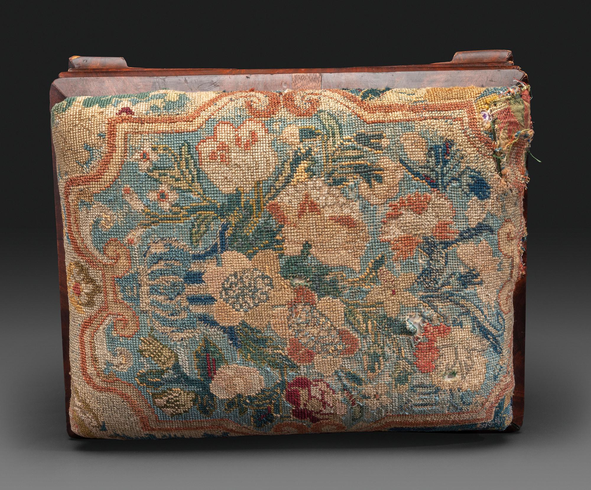 An American Empire Mahogany Veneered and Needlepoint Upholstered Footstool