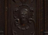 An impressive Renaissance Revival carved oak tall case clock, the case attributed to R.J. Horner & Co., New York, NY, with works by Winterhalder & Hofmeier, Schwaerzenbach, Black Forest, Germany, retailed by Tilden Thurber Co., Providence, RI, late 19th / early 20th century