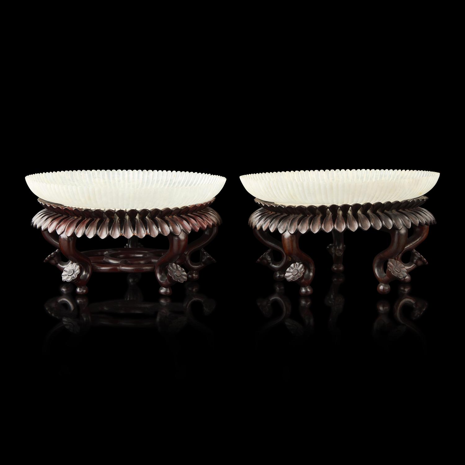 A Pair of Chinese White Jade 'Chrysanthemum' Dishes, Qing Dynasty to Republic Period 晚清-民國 白玉菊瓣盤一對