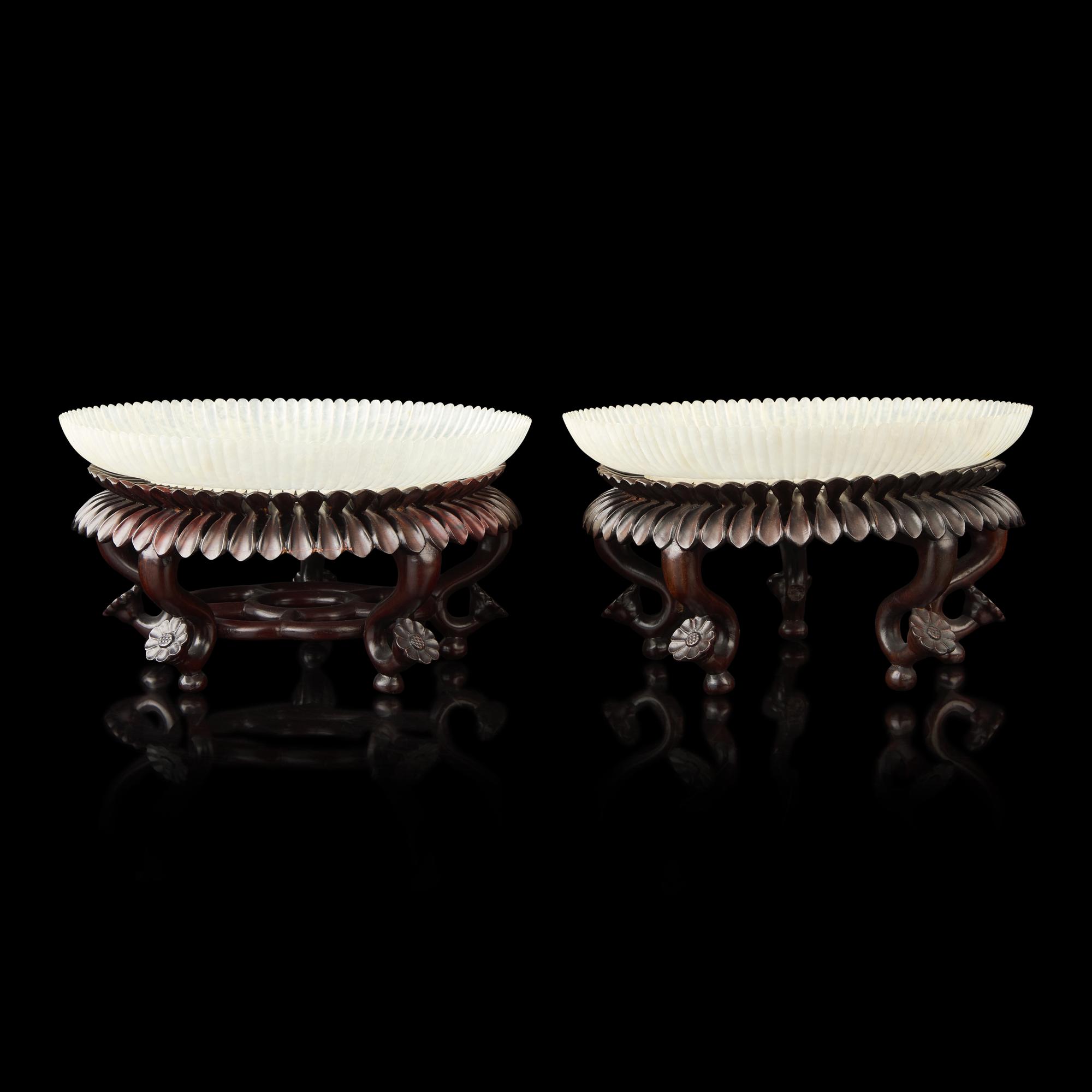 A Pair of Chinese White Jade 'Chrysanthemum' Dishes, Qing Dynasty to Republic Period 晚清-民國 白玉菊瓣盤一對