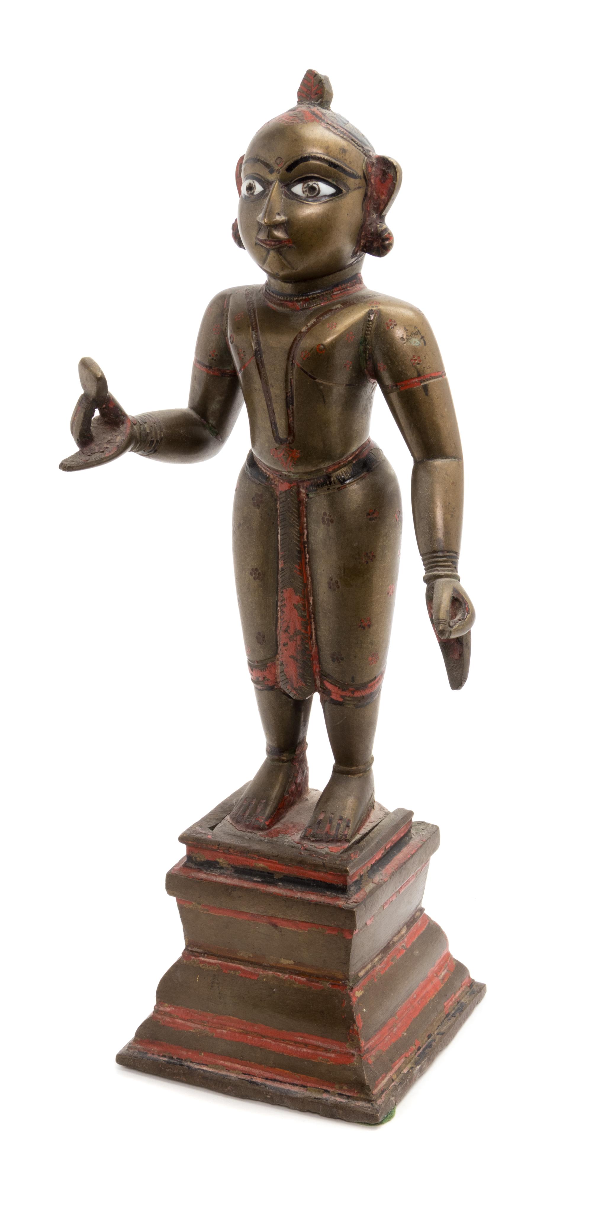 An Indian Bronze Figure Height overall 14 3/4 inches. — BENGAL, 18TH/19TH CENTURY