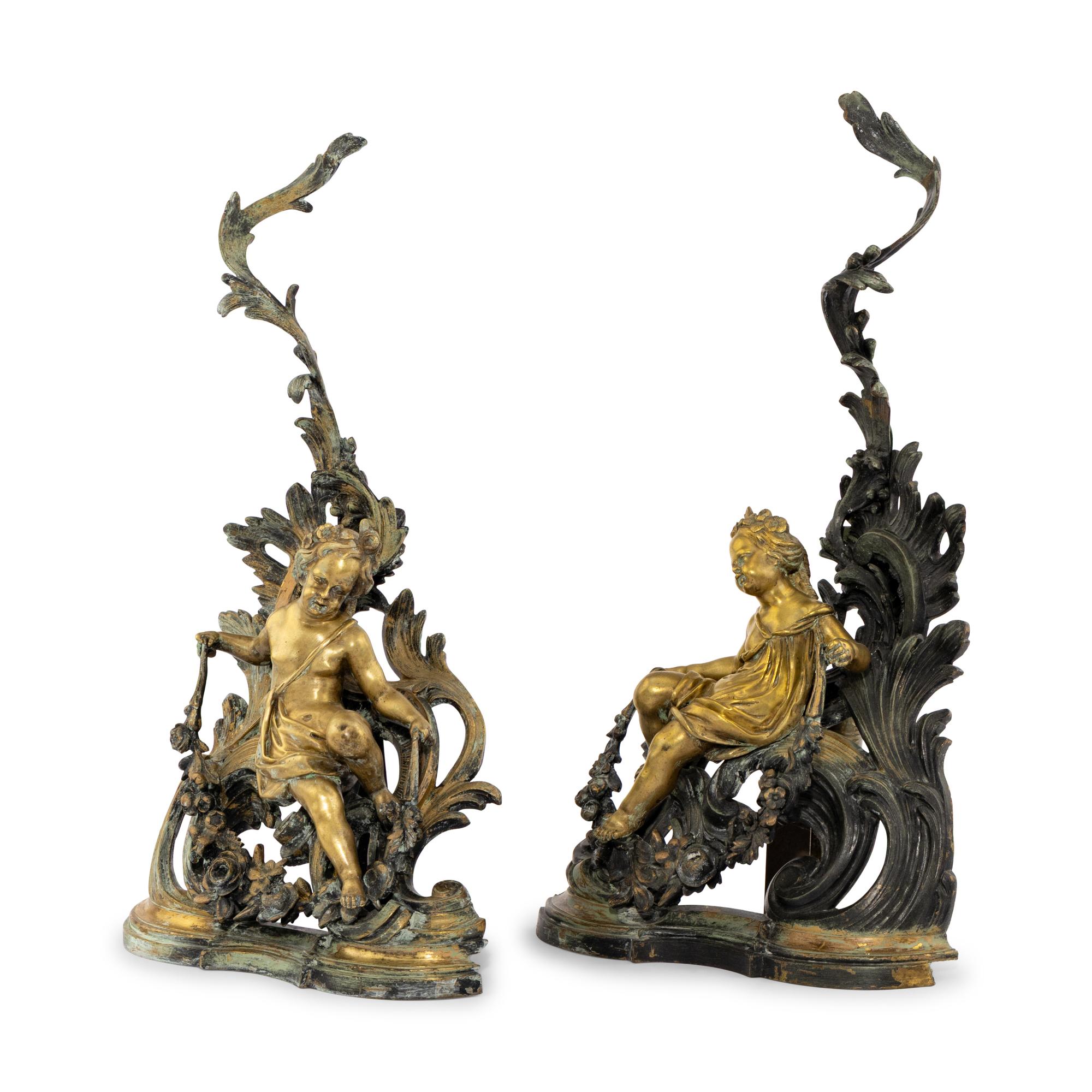 A Pair of Louis XV Style Gilt and Patinated Bronze Chenets
