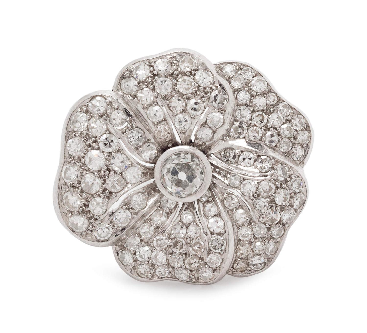 A Platinum and Diamond Flower Motif Brooch,