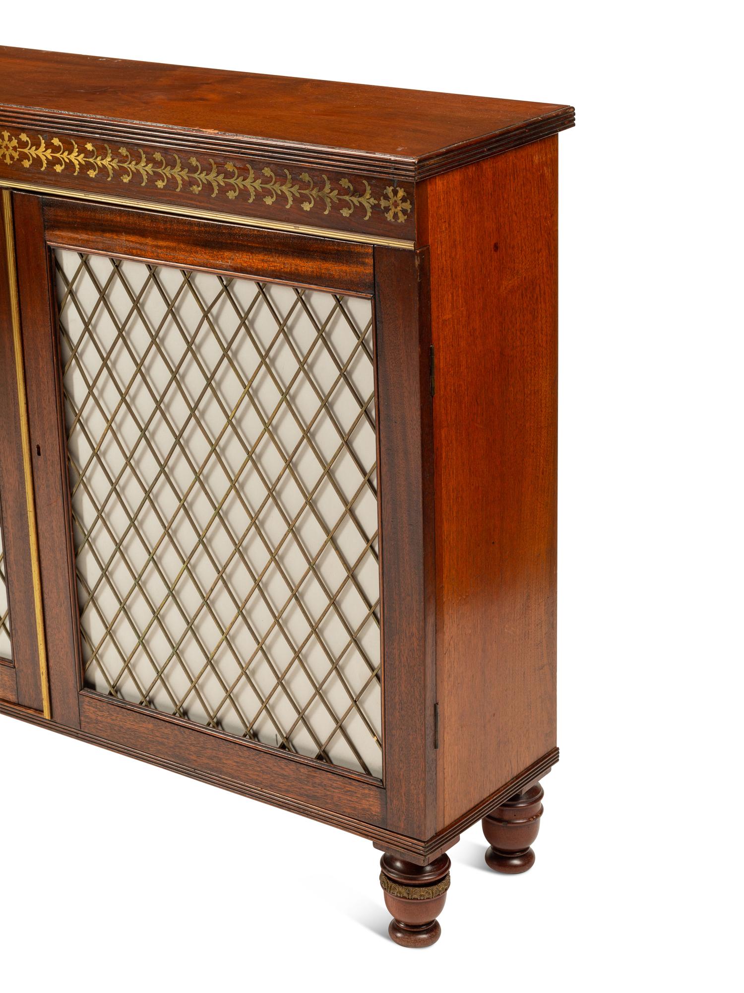 A Pair of Regency Style Brass Inlaid Mahogany Cabinets