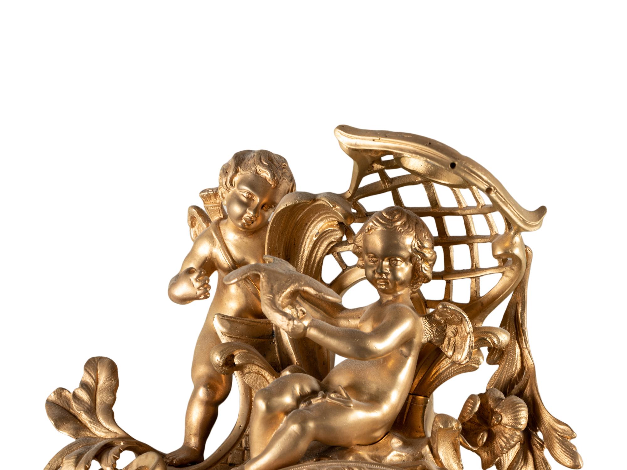 A Louis XV Style Gilt Bronze Cartel Clock