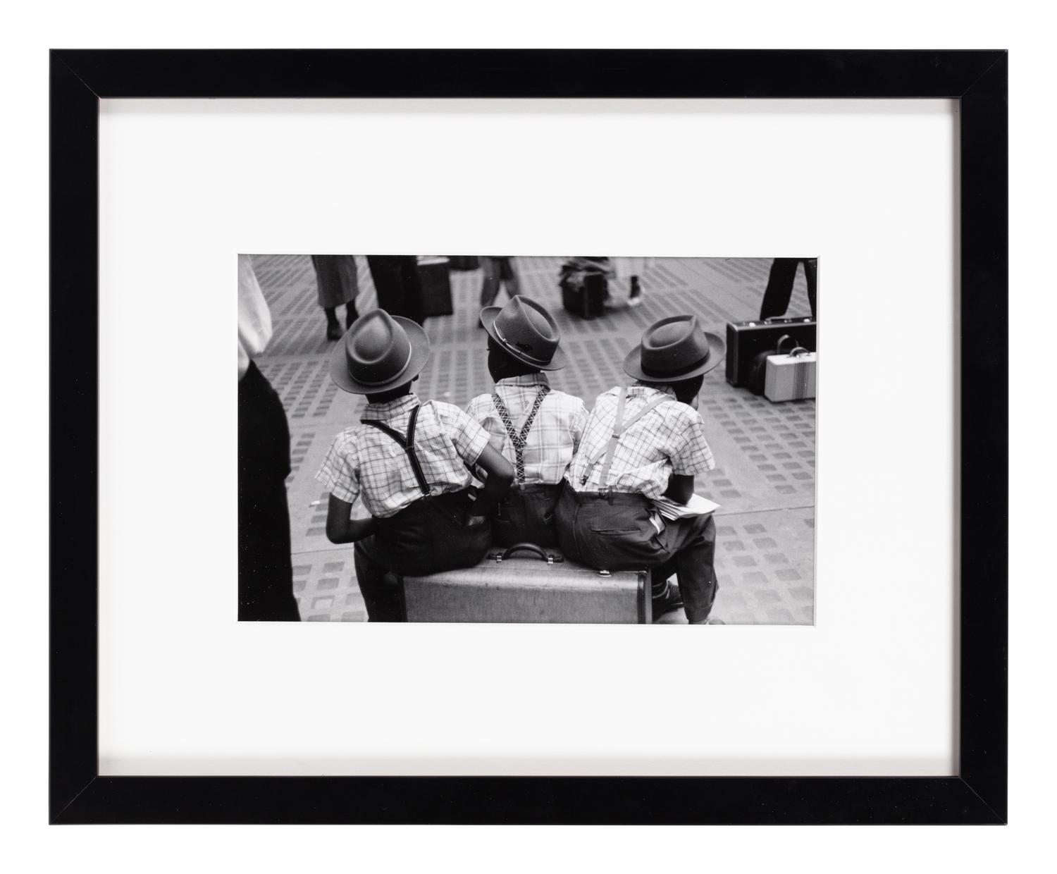 Ruth Orkin (1921-1985) Three Boys on a Suitcase, Penn Station, 1947