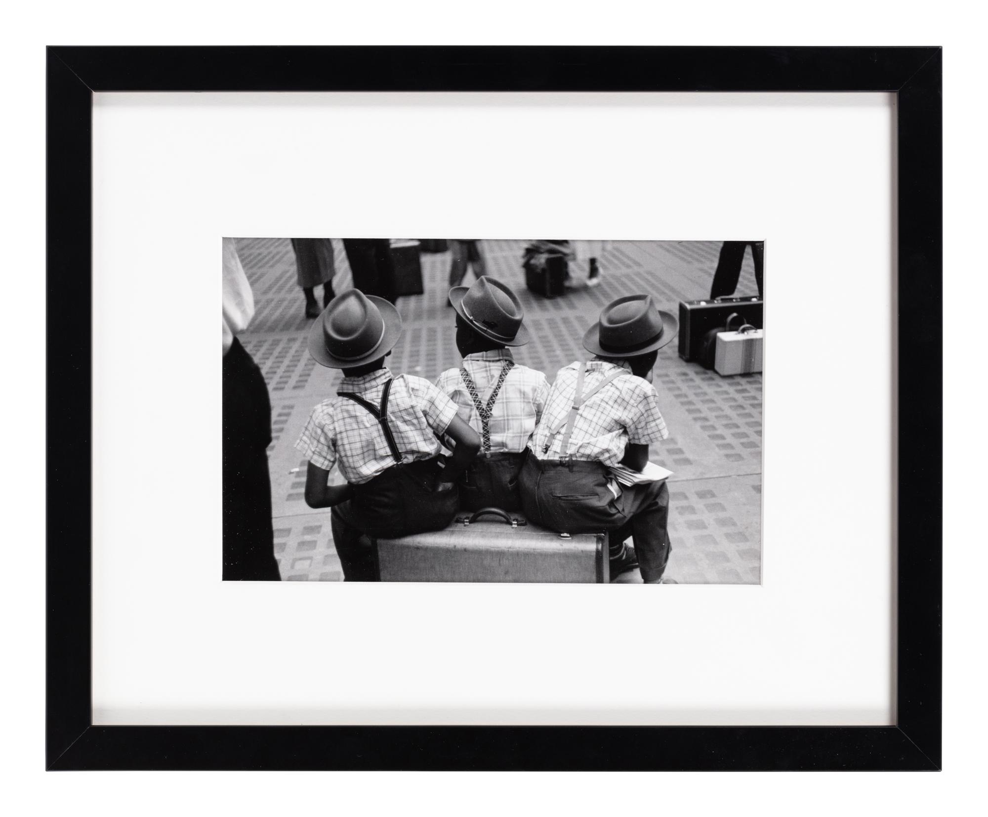 Ruth Orkin (1921-1985) Three Boys on a Suitcase, Penn Station, 1947