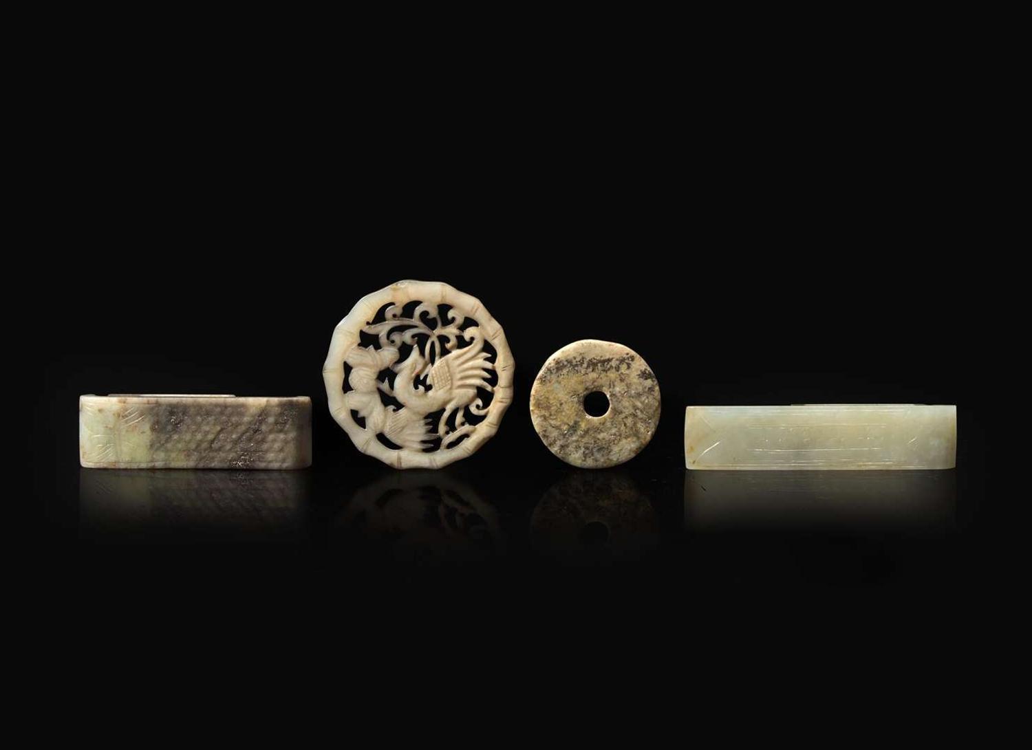 A group of four Chinese assorted jades 劍璏及玉珮一組四件