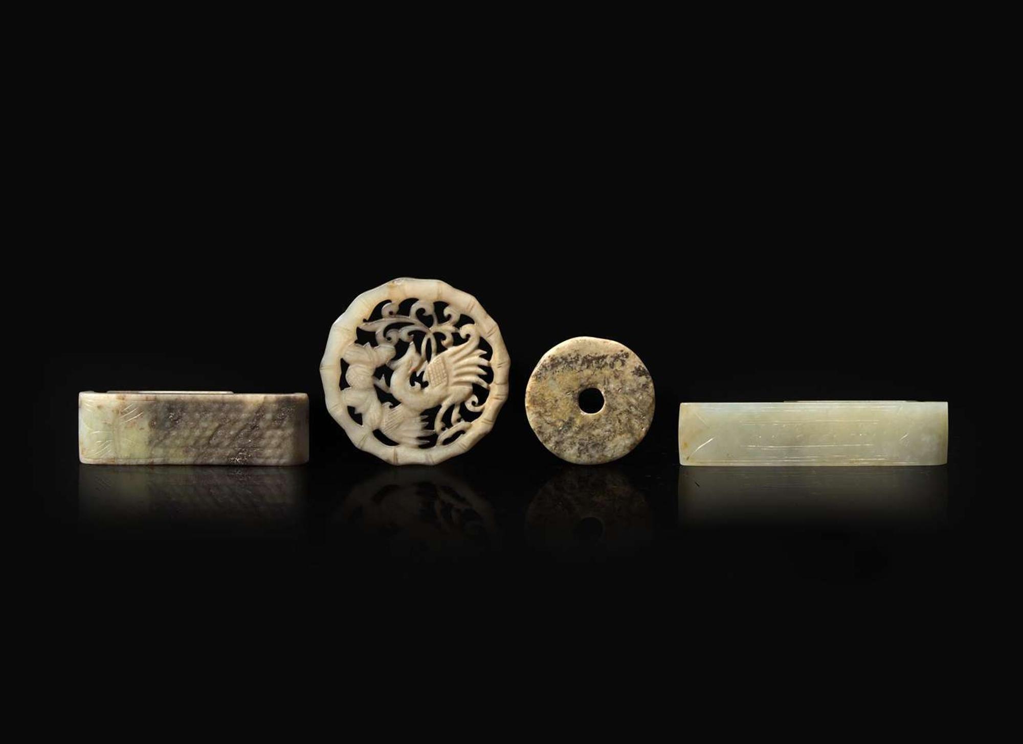 A group of four Chinese assorted jades 劍璏及玉珮一組四件