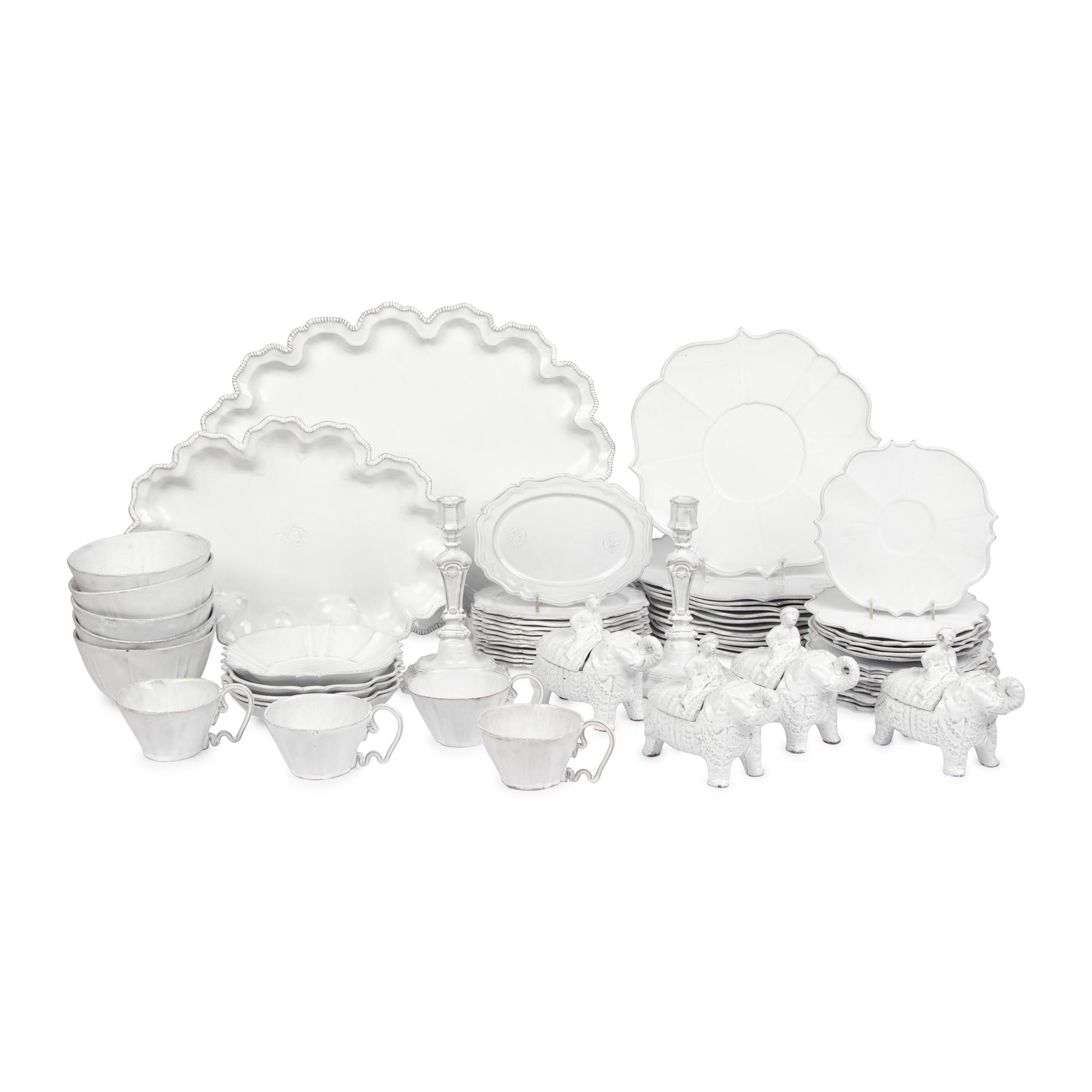 An Assembled White Glazed Earthenware Table Service