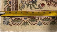 A Kirman Wool Rug
