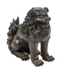 A Bronze Chinese Foo Dog Height 15 1/4 inches.