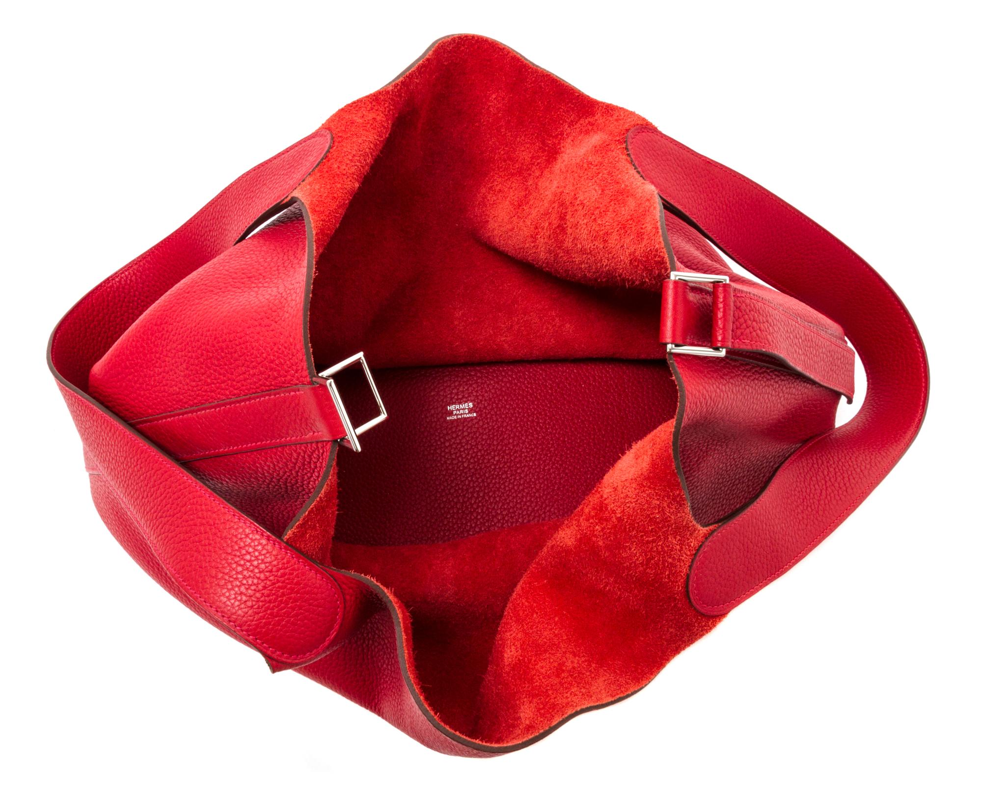 An Hermes Rouge Casaque Taurillon Clemence Picotin Lock TGM Handbag, 13" x 13" x 9".