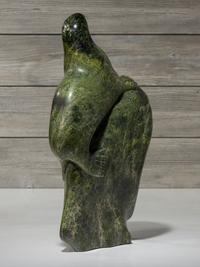 stone sculpture, woman and seal