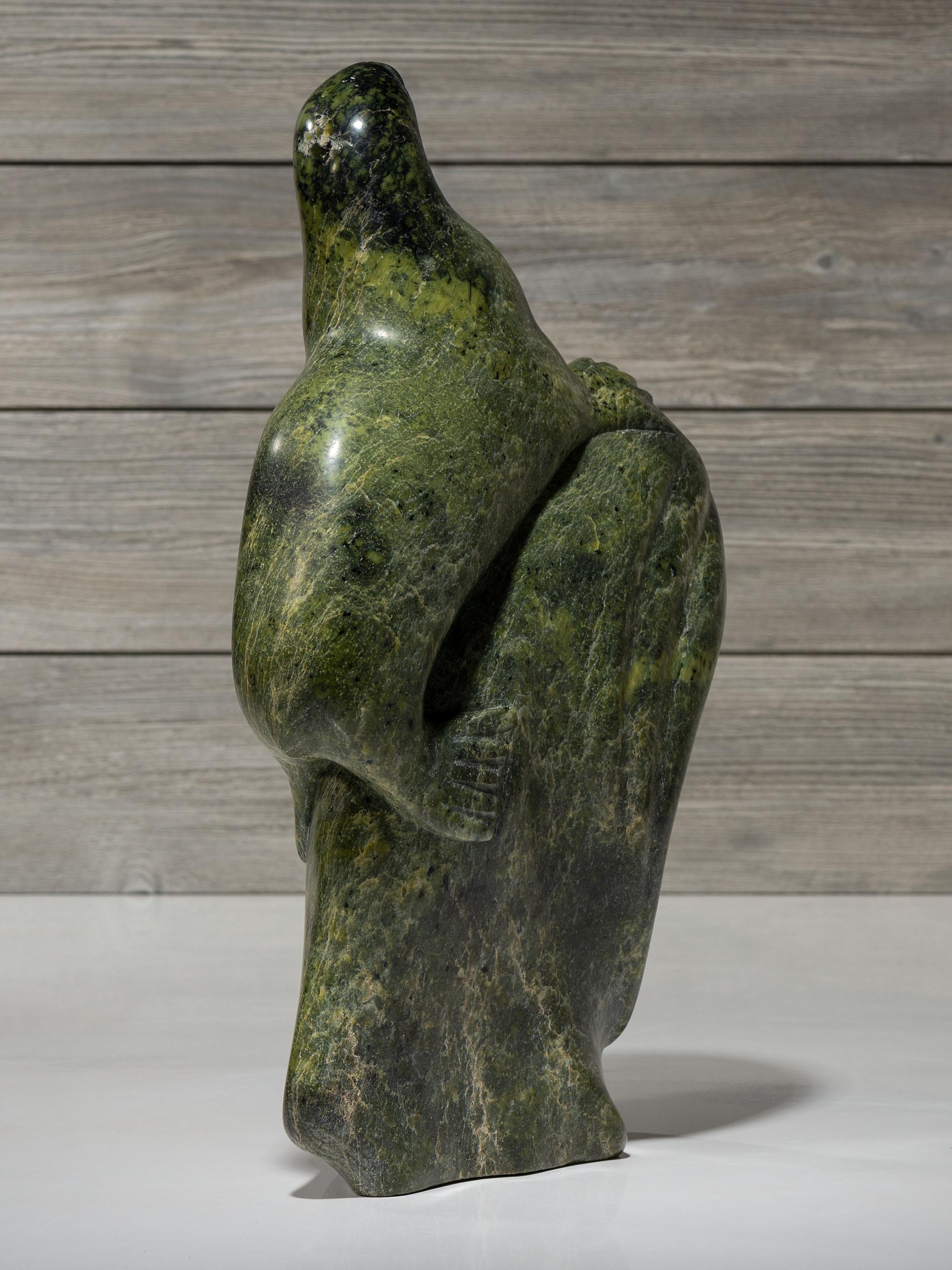 stone sculpture, woman and seal