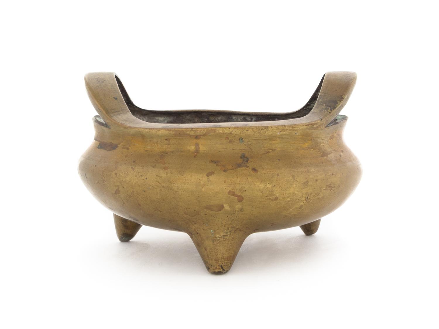 A Gilt Bronze Tripod Censer Diameter 6 inches.