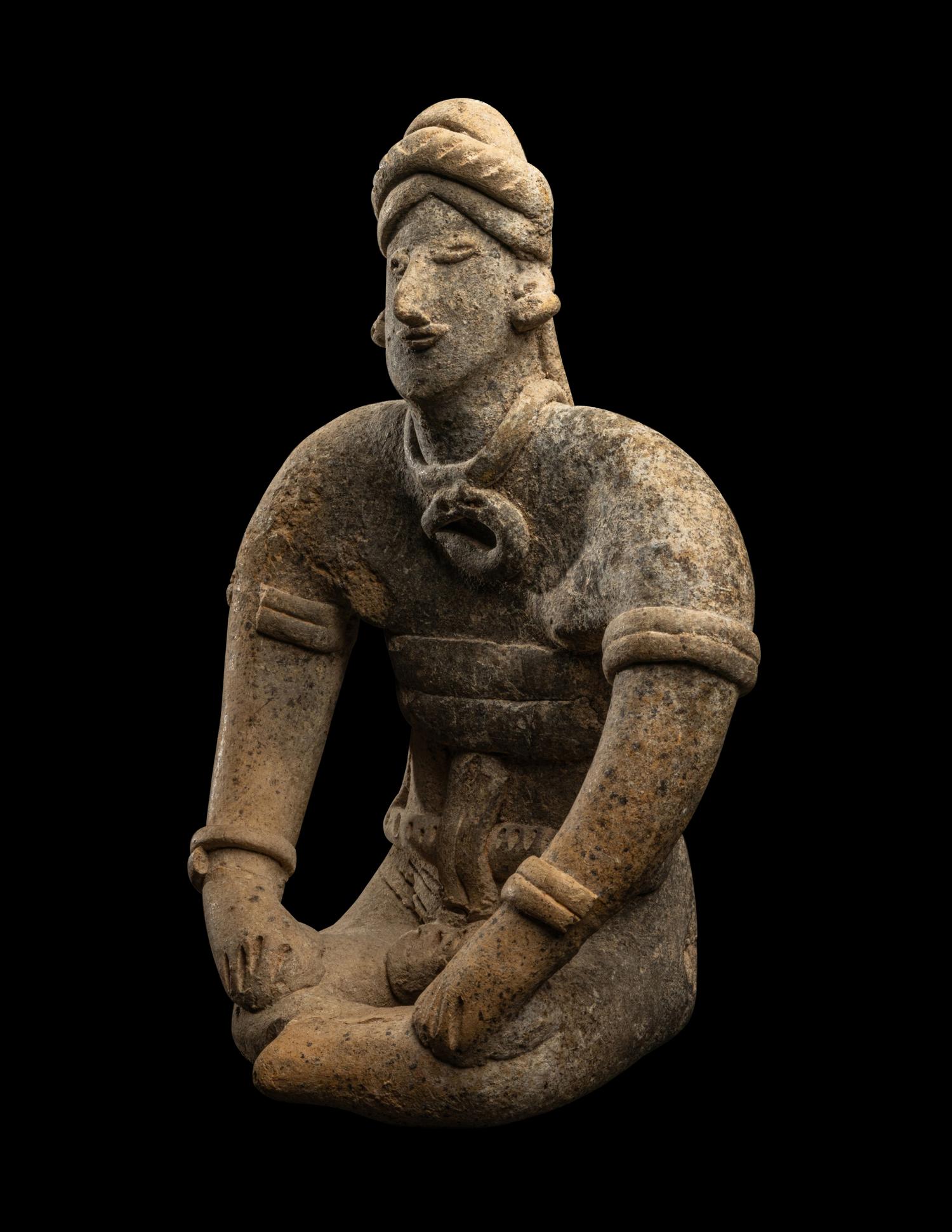 A Colima Seated Figure