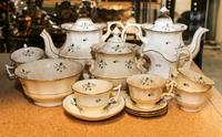An English Porcelain Tea Service Height of coffee pot 9 1/2 inches. — 19TH CENTURY