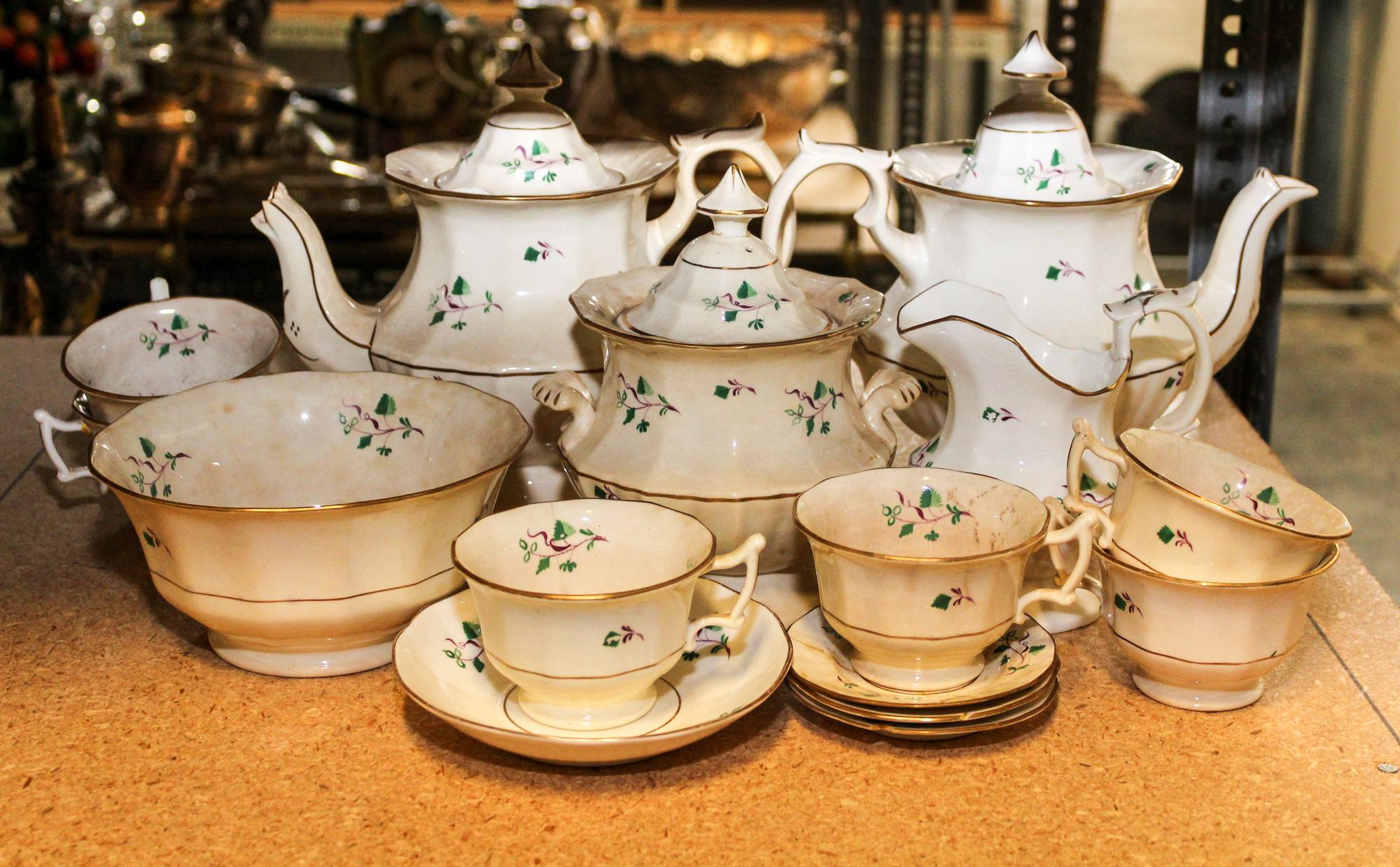 An English Porcelain Tea Service Height of coffee pot 9 1/2 inches. — 19TH CENTURY