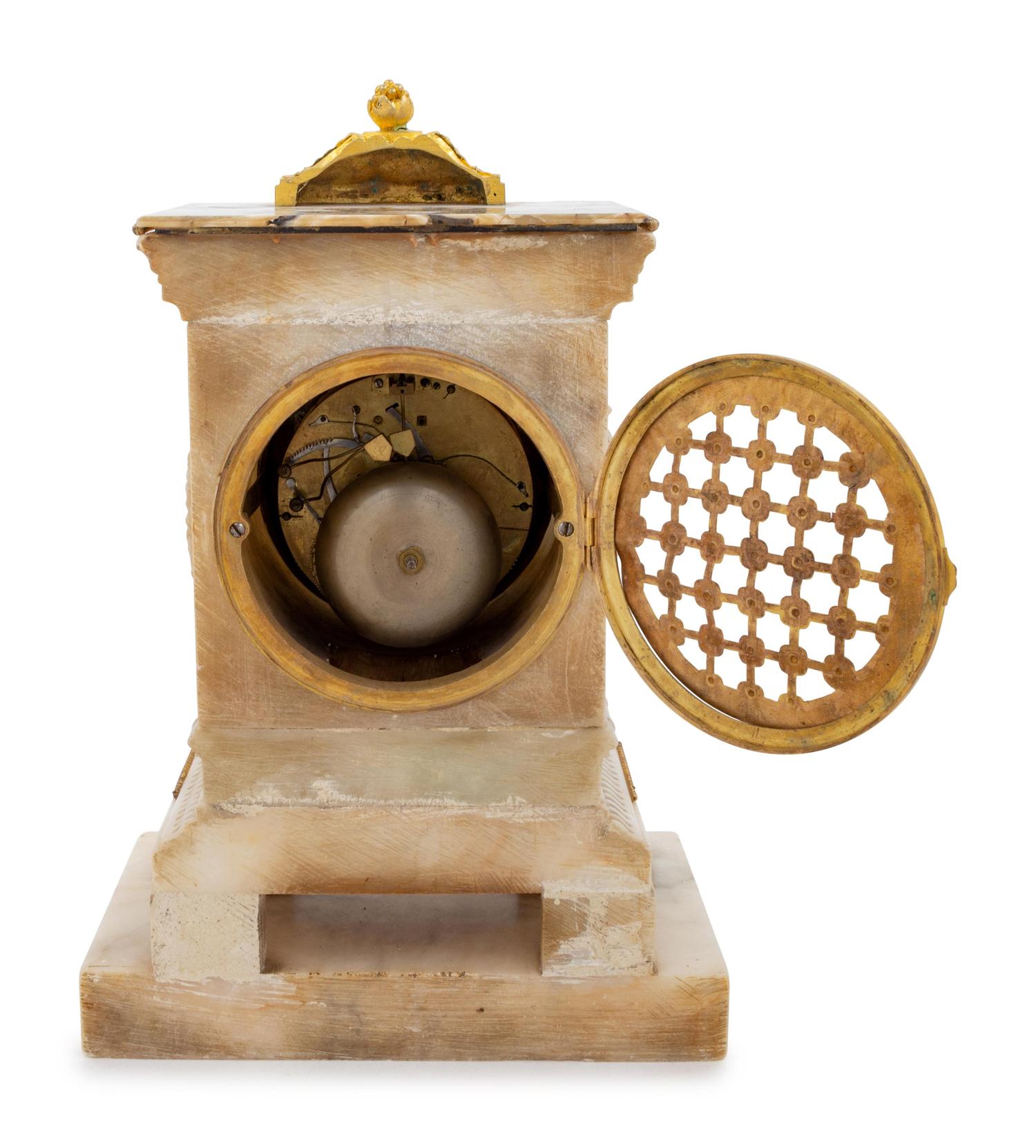 A Continental Gilt Bronze Mounted Alabaster Mantel Clock