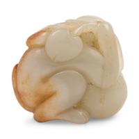 A Celadon and Russet Jade Figure of a Monkey