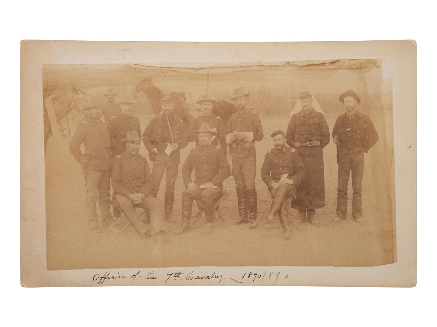 [WOUNDED KNEE]. A group of 5 boudoir photographs of 7th US Cavalry at Pine Ridge Agency, incl. officers and camp scenes. Chadron, NE: Northwestern Photographic Co., ca 1890-1891.