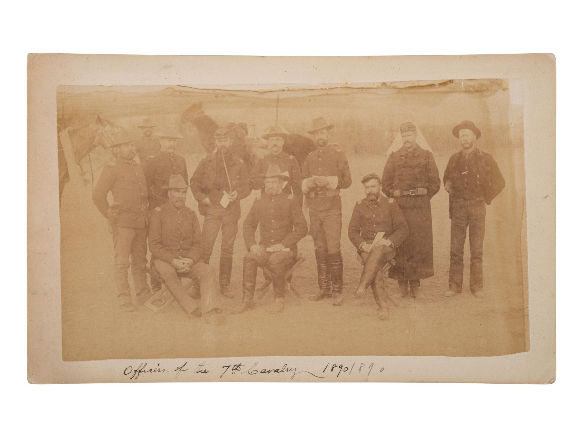 [WOUNDED KNEE]. A group of 5 boudoir photographs of 7th US Cavalry at Pine Ridge Agency, incl. officers and camp scenes. Chadron, NE: Northwestern Photographic Co., ca 1890-1891.