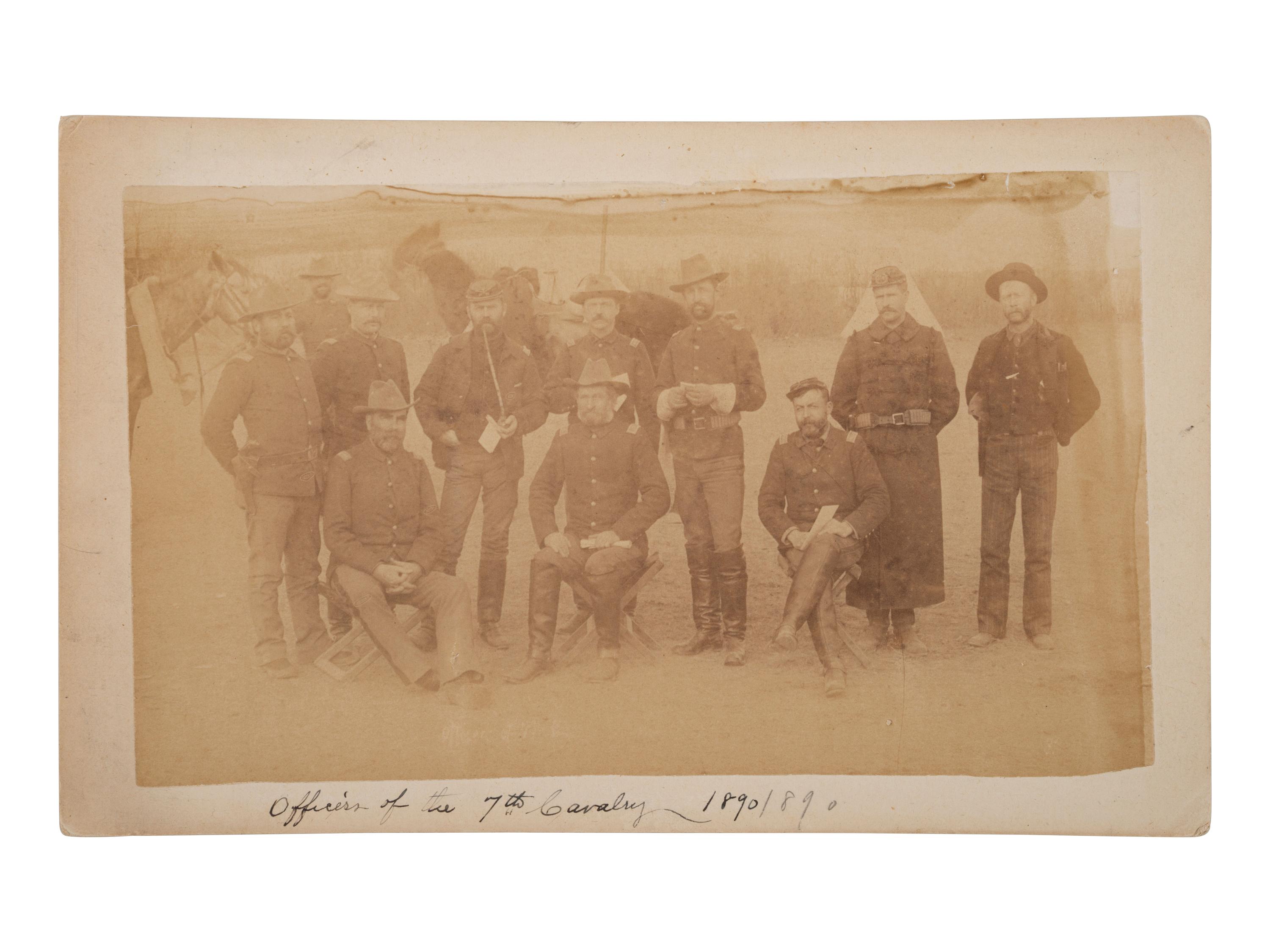 [WOUNDED KNEE]. A group of 5 boudoir photographs of 7th US Cavalry at Pine Ridge Agency, incl. officers and camp scenes. Chadron, NE: Northwestern Photographic Co., ca 1890-1891.
