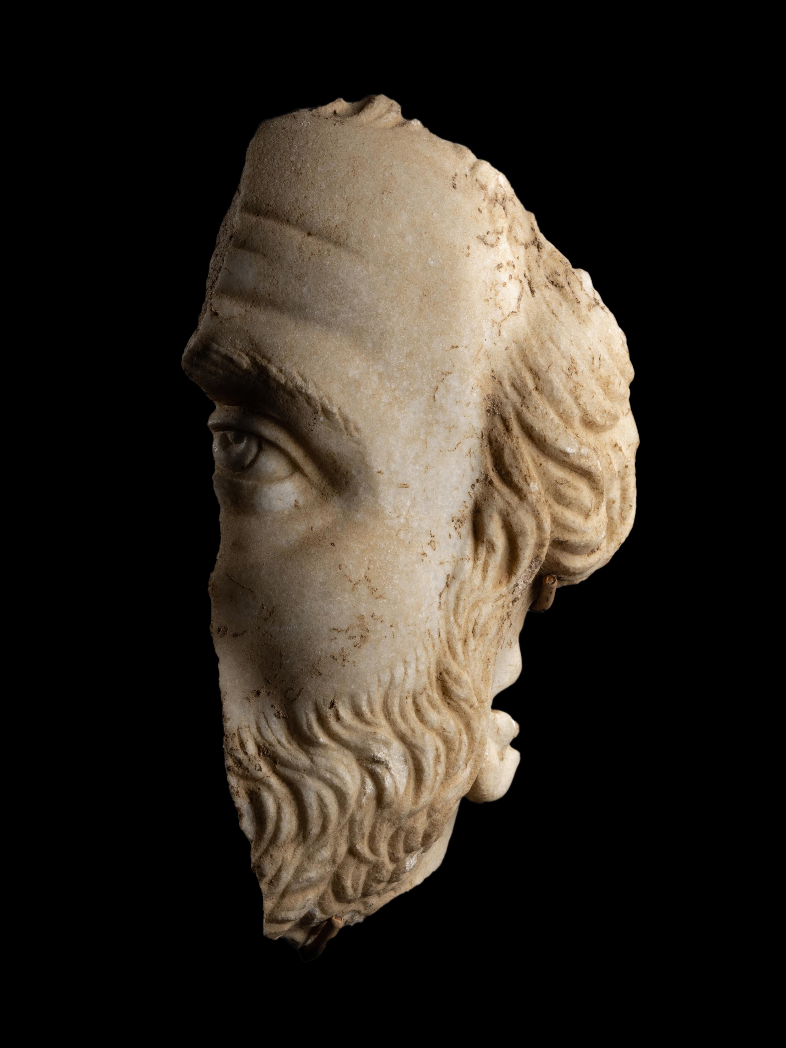 A Roman Marble Fragmentary Portrait Head of a Man