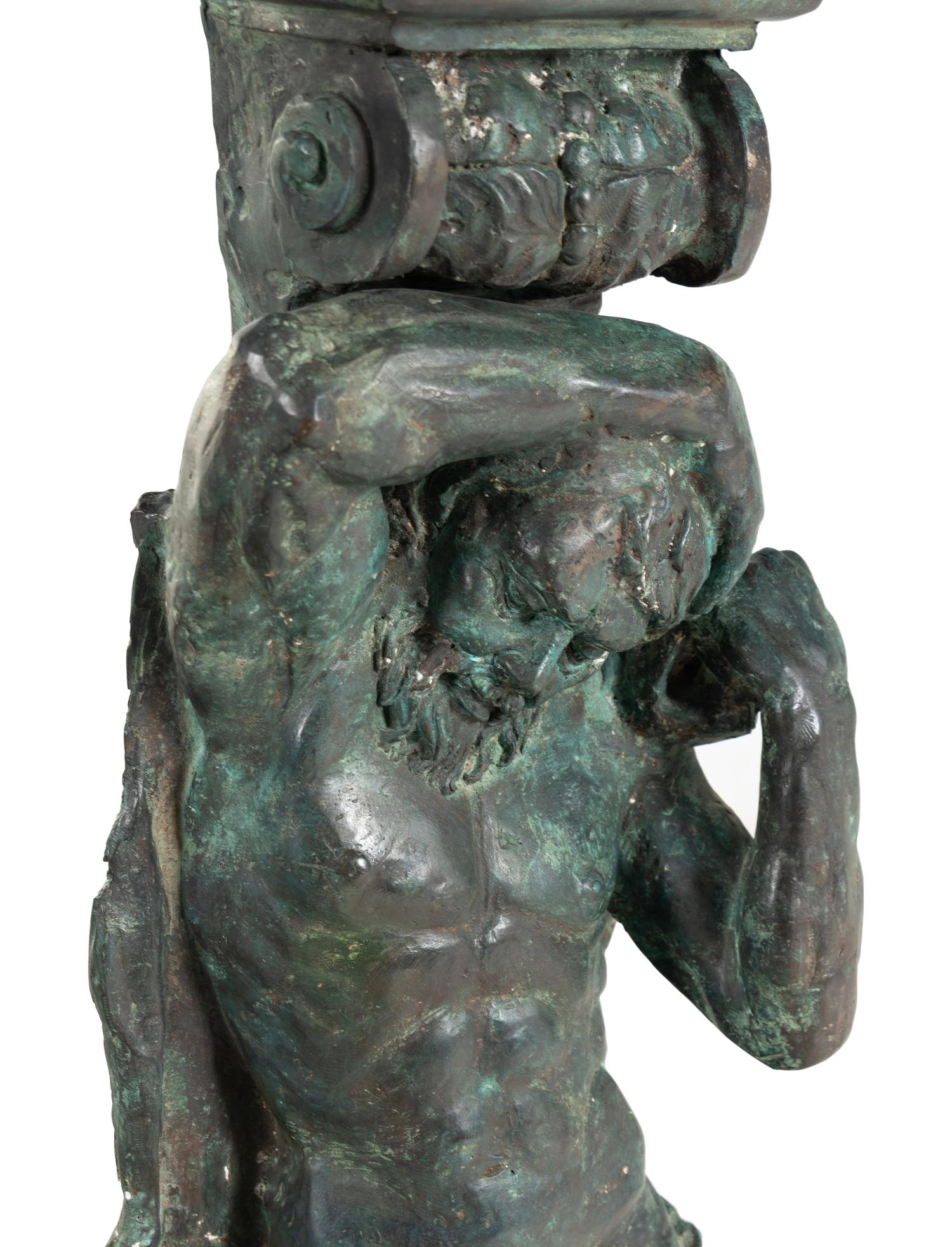 A Pair of Continental Cast Metal Figural Pedestals