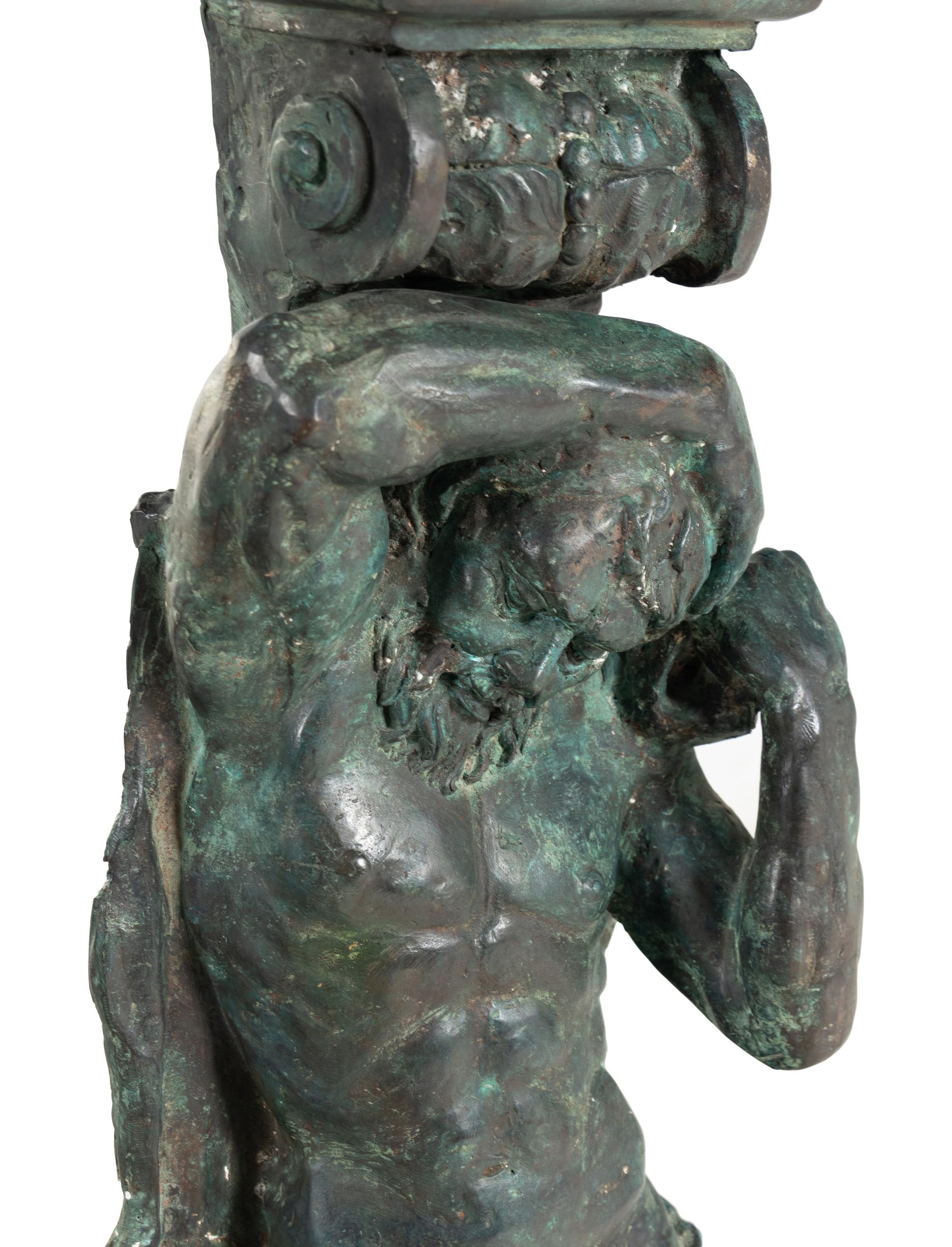 A Pair of Continental Cast Metal Figural Pedestals